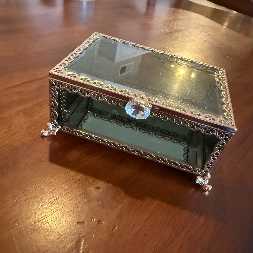 Elegant Glass Jewelry Box with Silver Accents